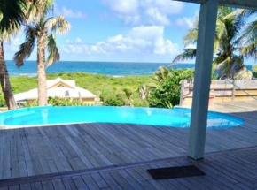 Villa de 4 chambres a Moule a 50 m de la plage avec vue sur la mer piscine privee et jardin clos